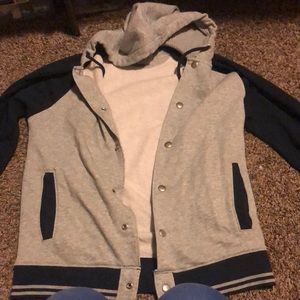 Blue and grey leather men jacket.